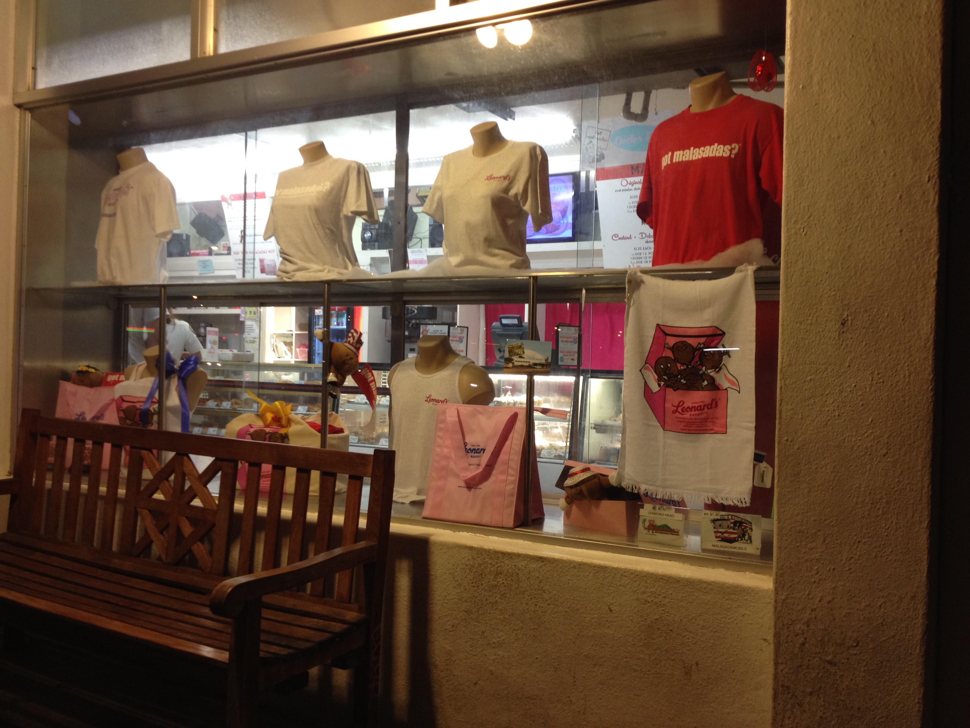 Leonard's Bakery storefront window with got malasadas merchandise